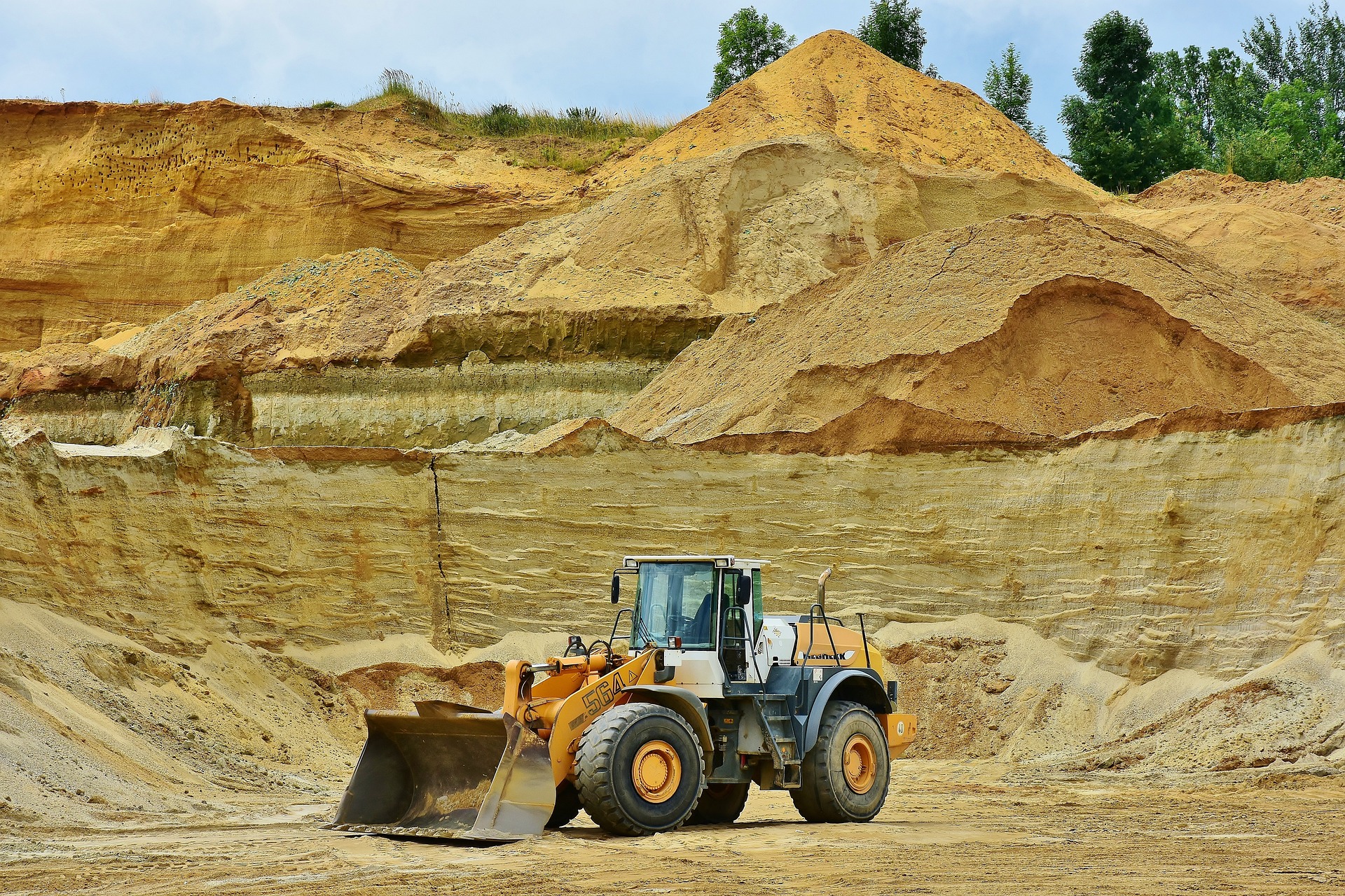 The sand mining process in Uganda.